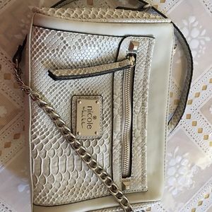 Excellent Nicole crossbody bag.